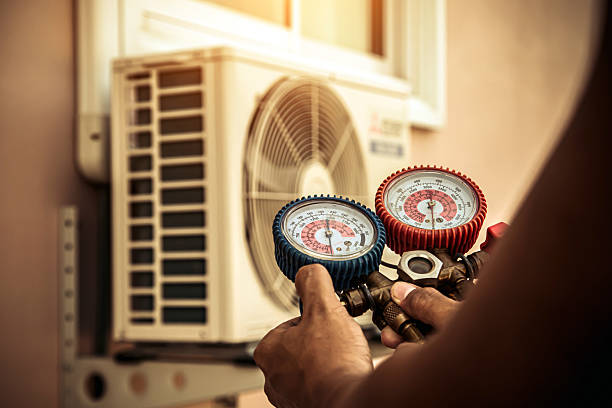 Professional Air Conditioning Service technician working in Mather, CA